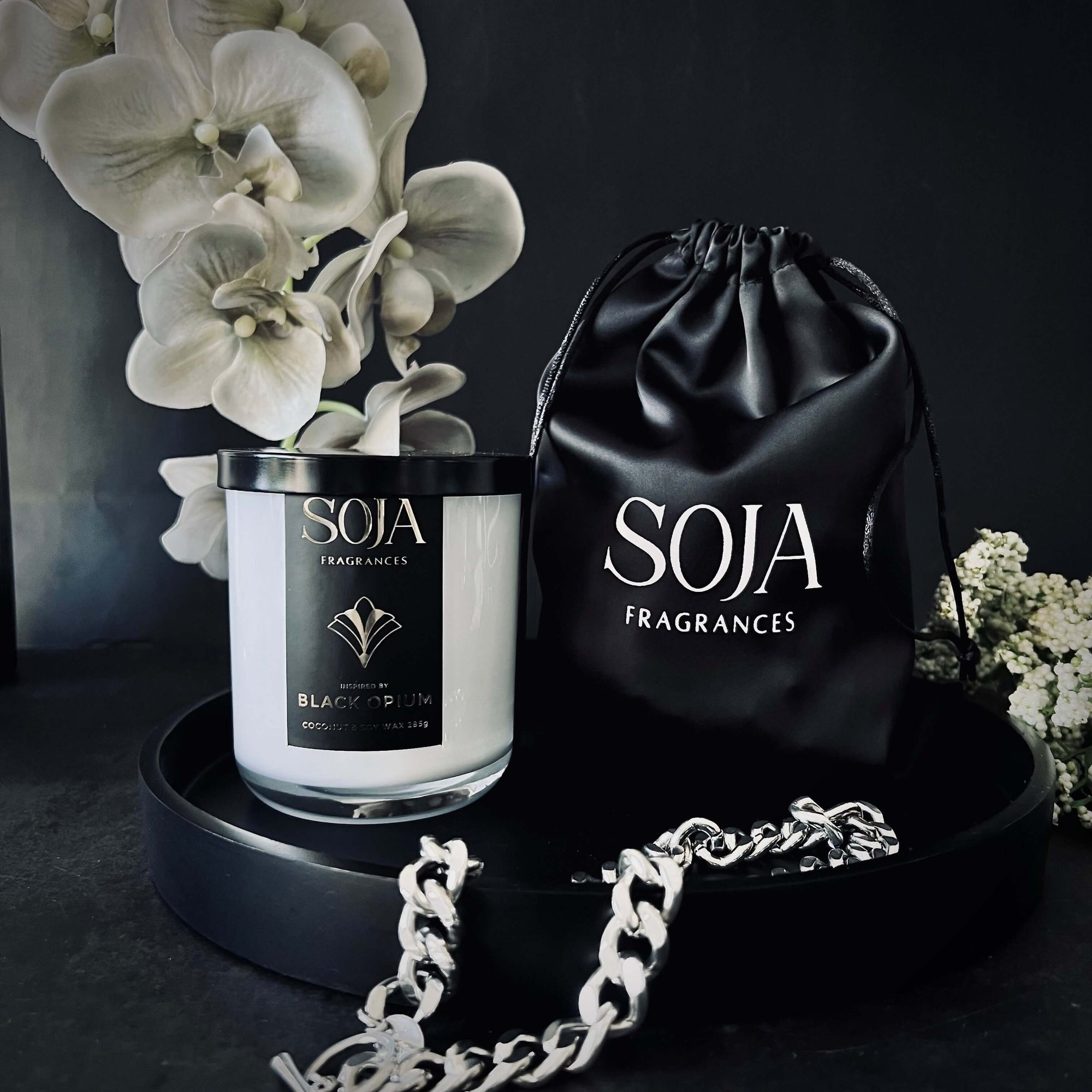 Black Opium 285gm Candle | Experience the luxury of our Black Opium crystal candle. A perfect blend of peach, citrus, and opulence in a crackling wood wick. Shop affordable scents. | SOJA Fragrances