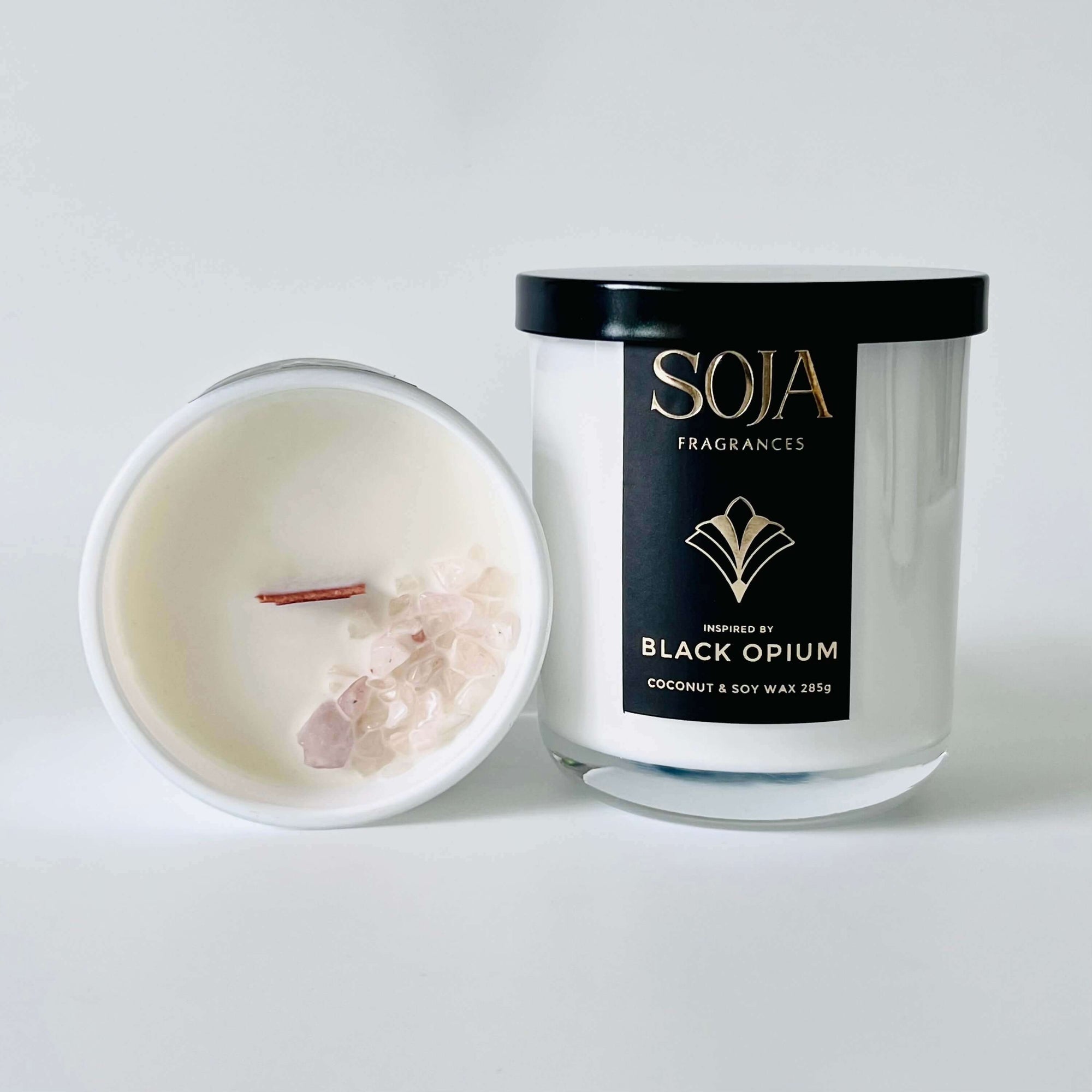 Black Opium 285gm Candle | Experience the luxury of our Black Opium crystal candle. A perfect blend of peach, citrus, and opulence in a crackling wood wick. Shop affordable scents. | SOJA Fragrances