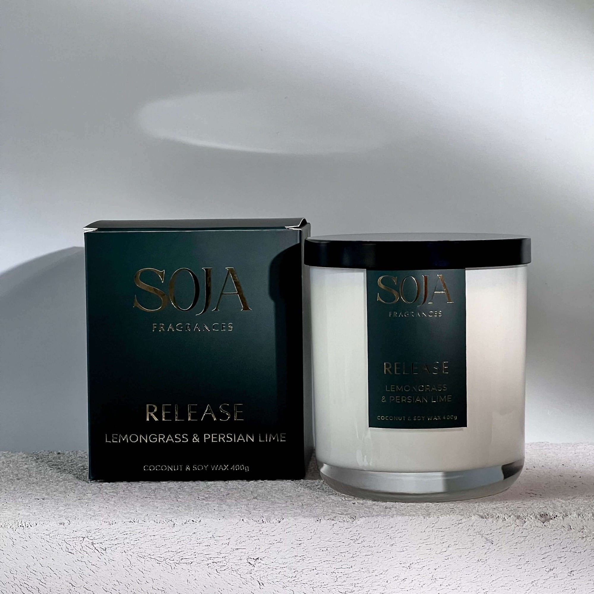 Release - Lemongrass &amp; Persian Lime Candle | Embrace tranquility with our Lemongrass &amp; Persian Lime Candle, infused with Prehnite crystals for serene energy. Enjoy 70 hours of aromatic bliss. | SOJA Fragrances