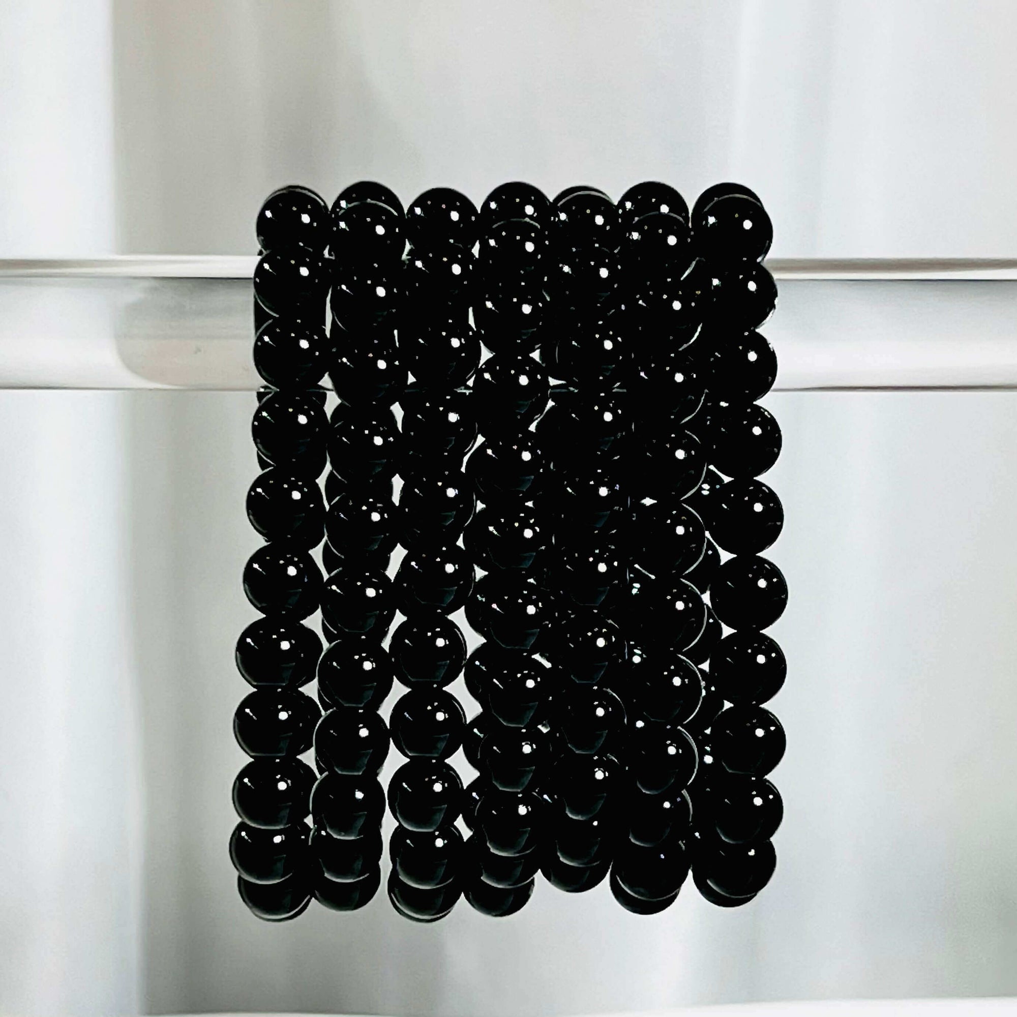 Black Onyx Crystal Bracelet | Elevate balance and protection with our handcrafted Black Onyx Crystal Bracelet. Browse Soja Fragrances for exclusive crystal beaded bracelets. | SOJA Fragrances