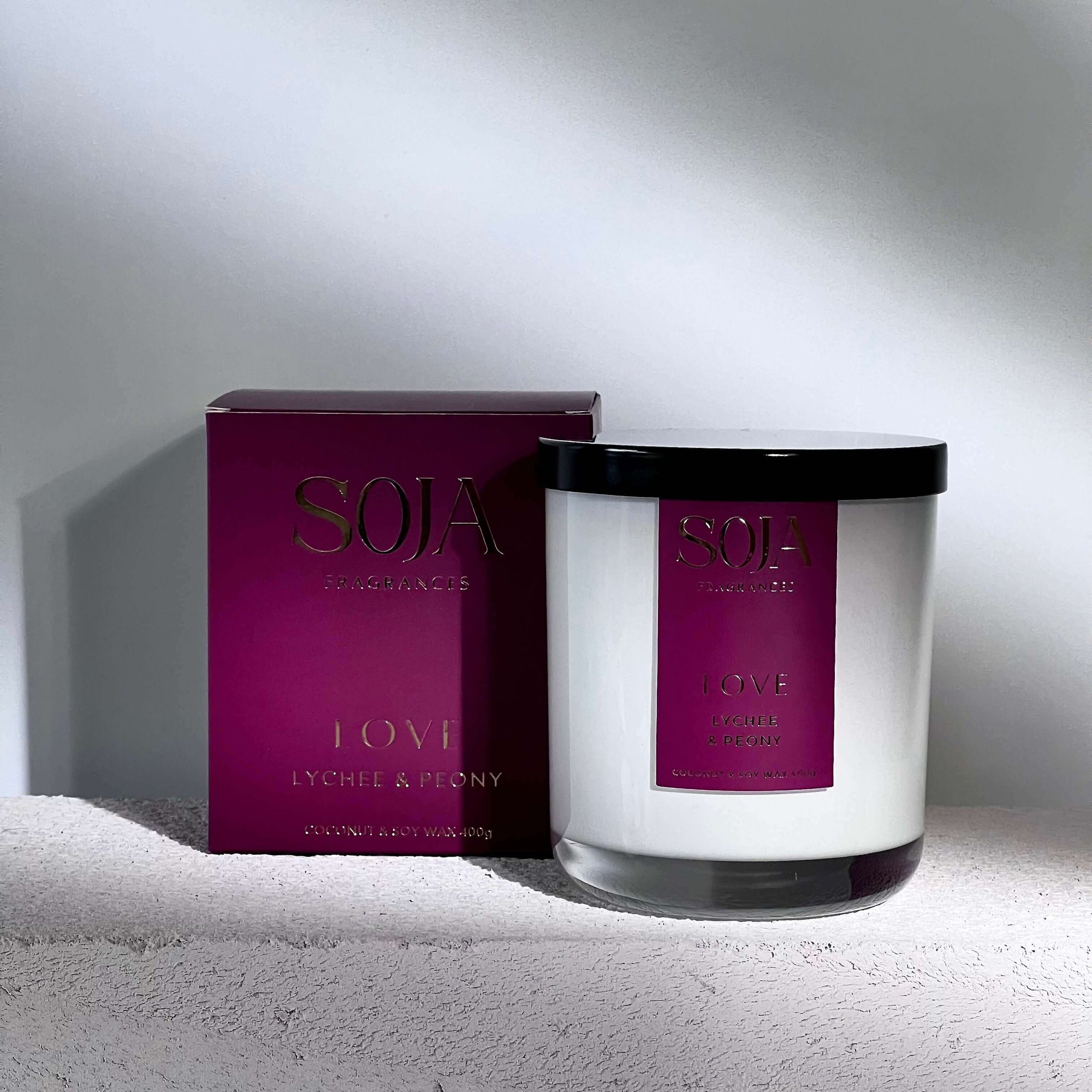 Love - Lychee & Peony Candle | Infuse your space with the scent of lychee & peony, enhanced by Rose Quartz's energy. Natural wax, 70-hr burn for a loving ambiance. | SOJA Fragrances