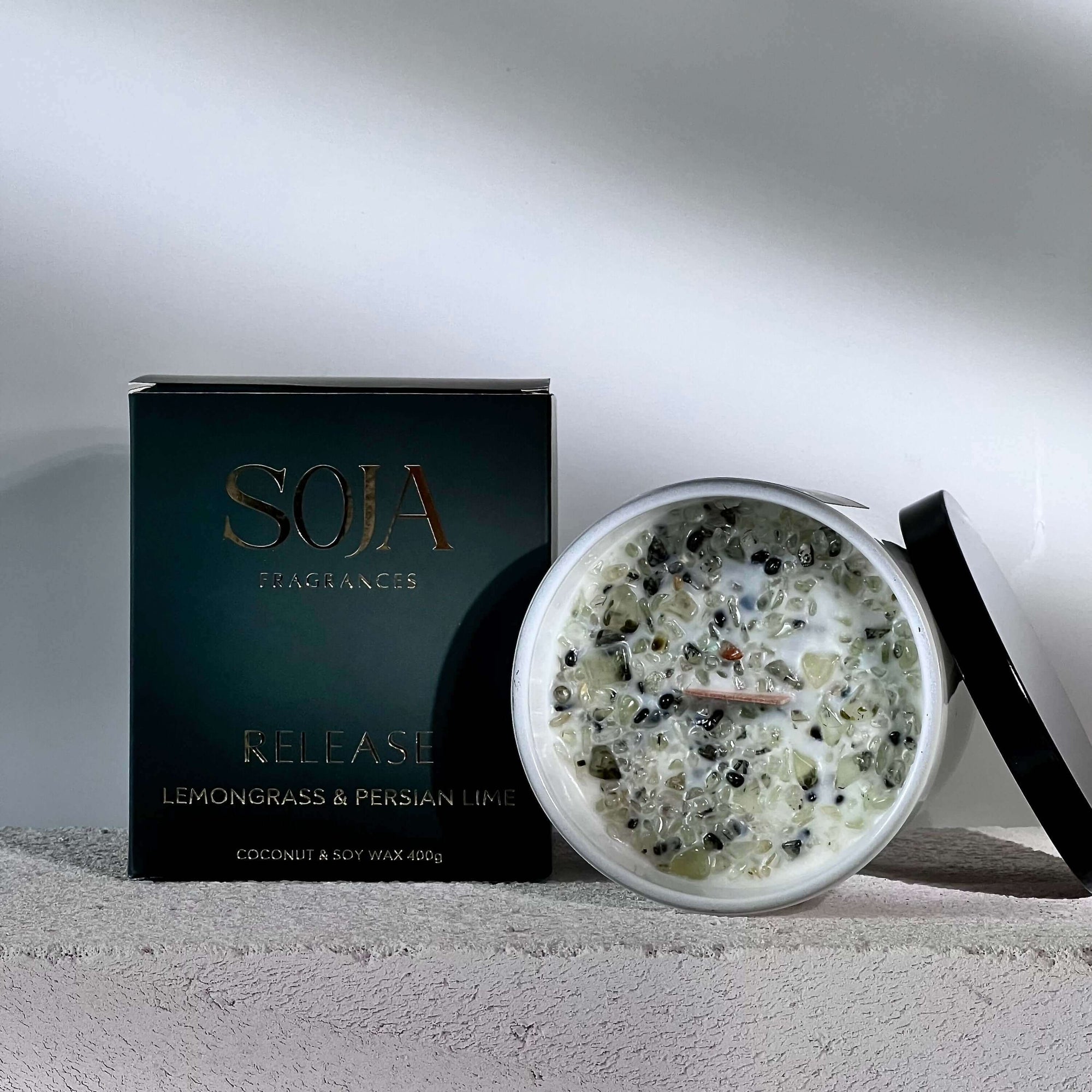 Release - Lemongrass & Persian Lime Candle | Embrace tranquility with our Lemongrass & Persian Lime Candle, infused with Prehnite crystals for serene energy. Enjoy 70 hours of aromatic bliss. | SOJA Fragrances